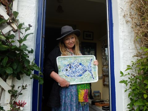 Mary Killen of The Spectator's 'Dear Mary' column holding a winsome tray.