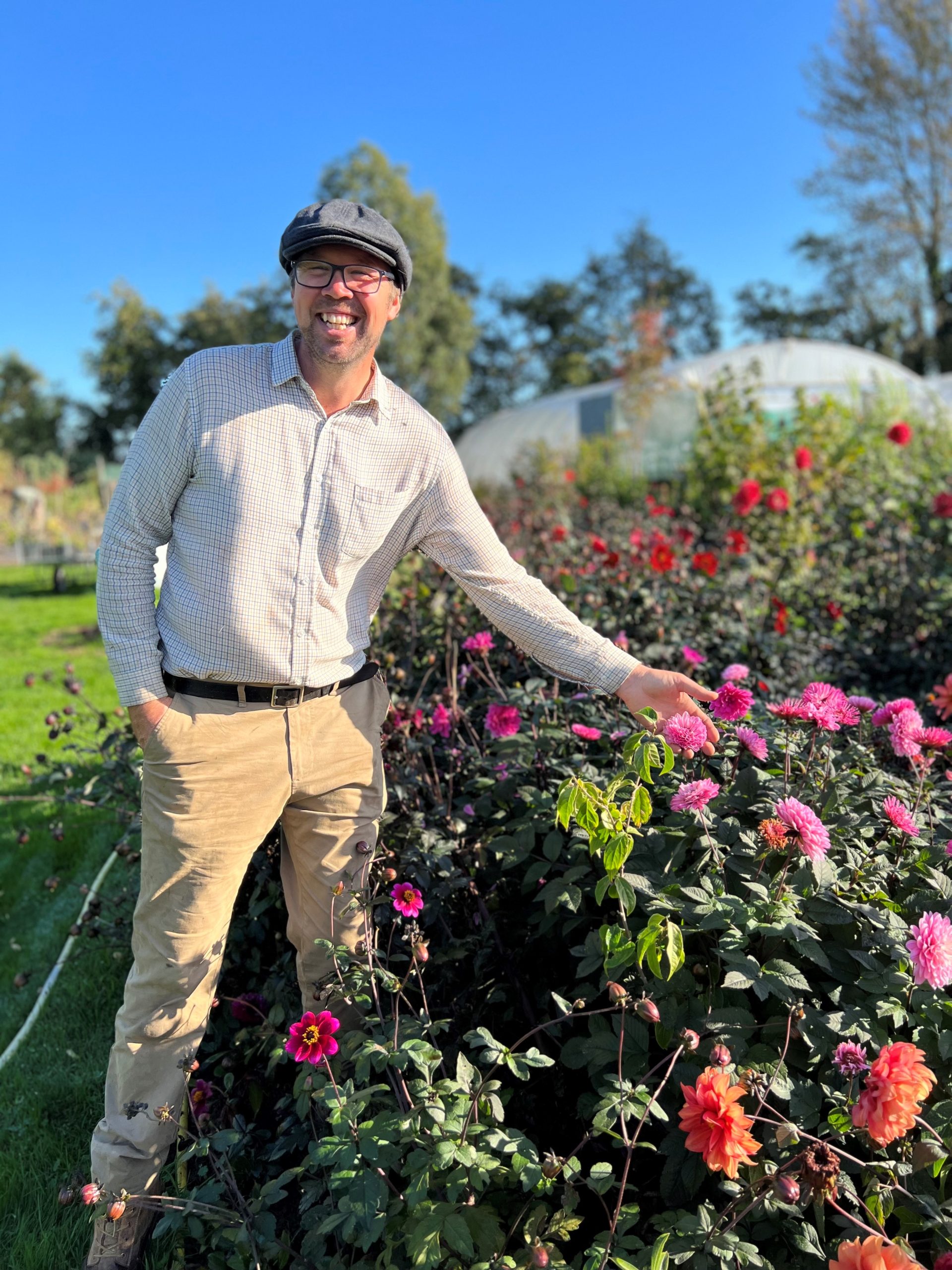 Steve Edney with one of his beloved dahlias.